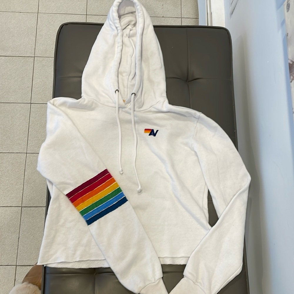 Ladie super soft Aviator Nation pullover hoodie with signature striped details.